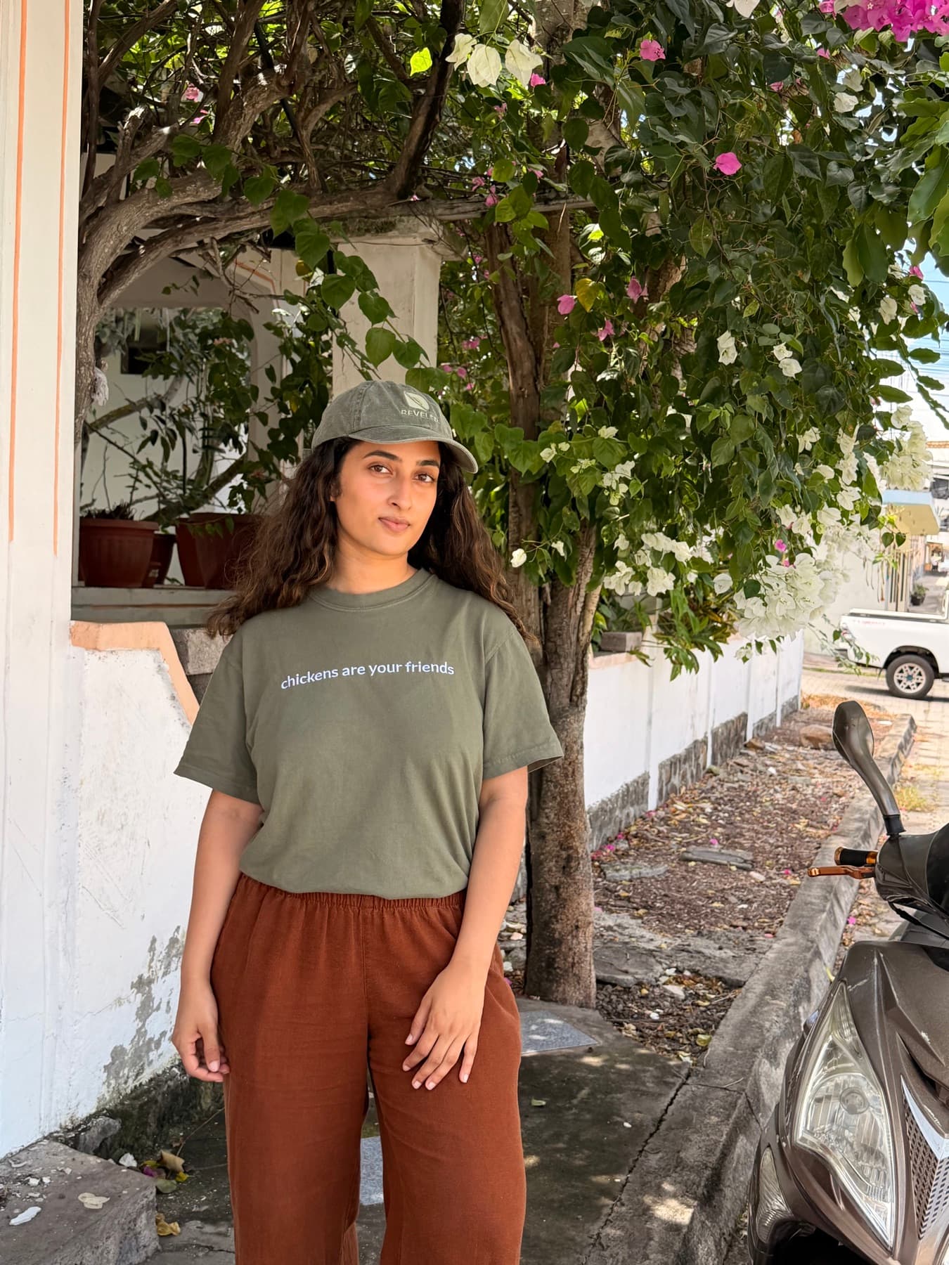 Wearing the chickens are your friends tee